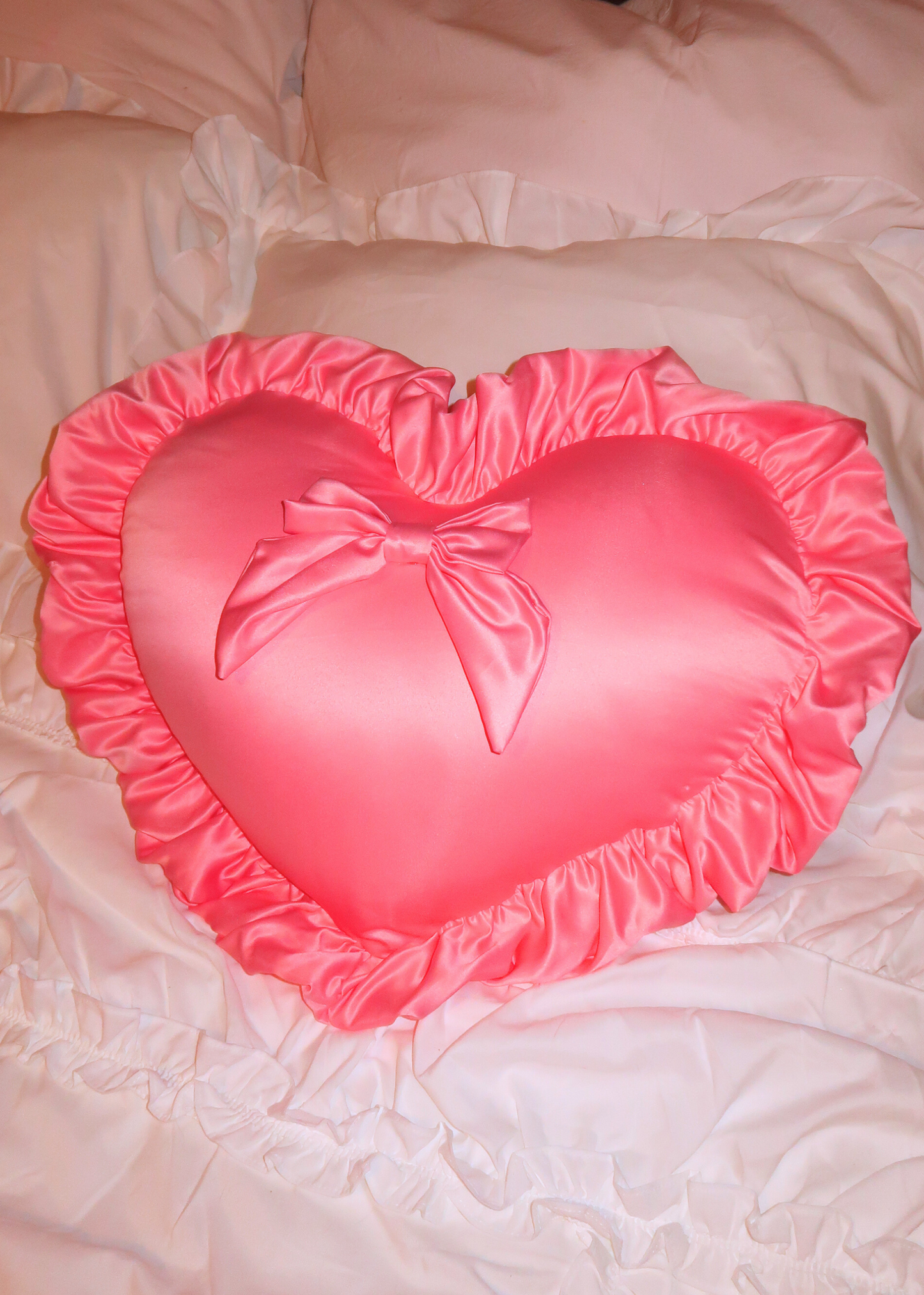 PINK HEART PILLOW WITH A BOW