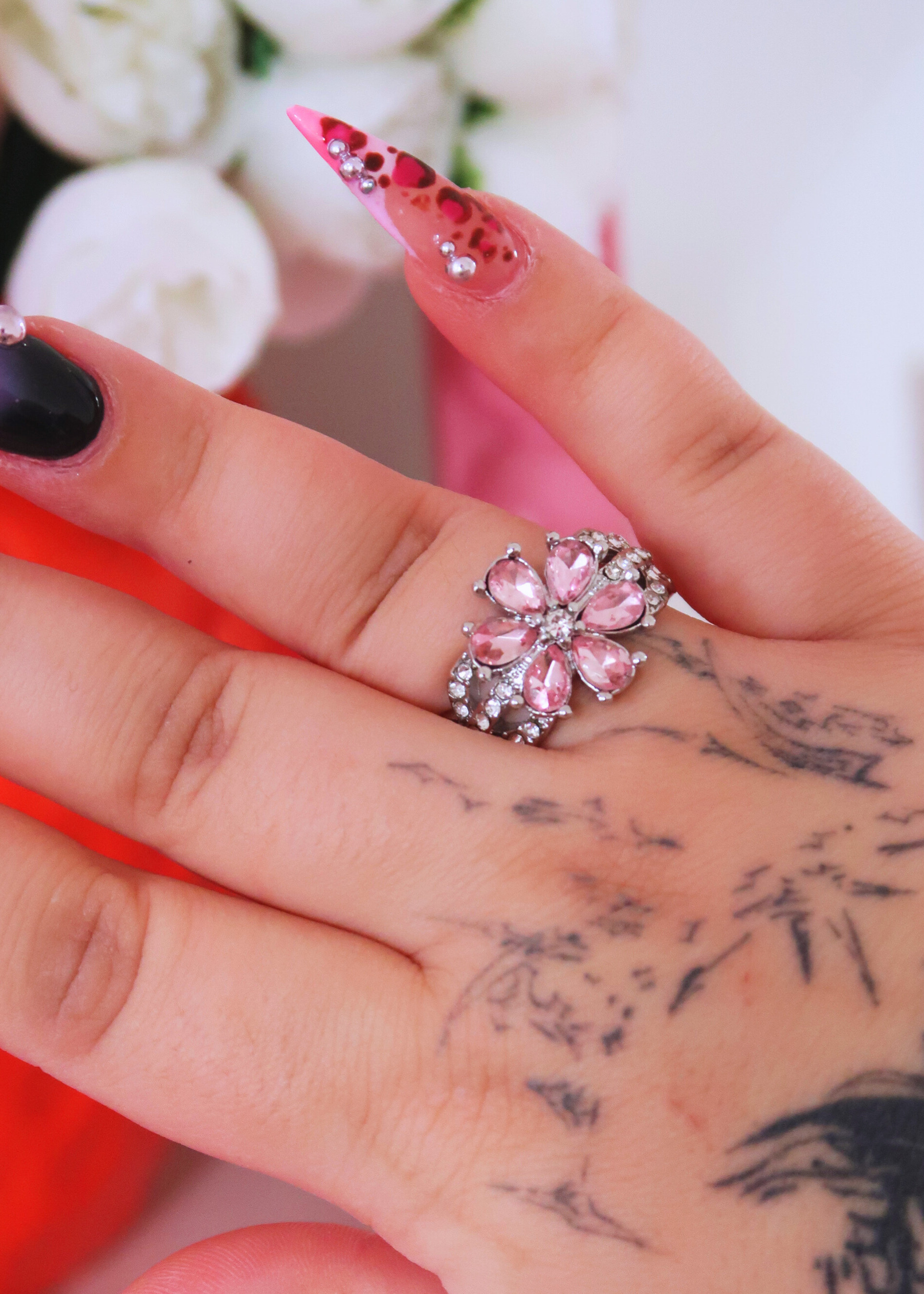 PINK AND WHITE SPARKLY FLOWER ring