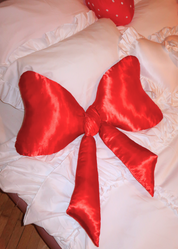 RED SATIN BOW PILLOW