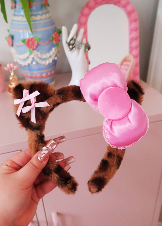 PLUSHY GLAMOUR HEADBAND WITH A PINK BOW