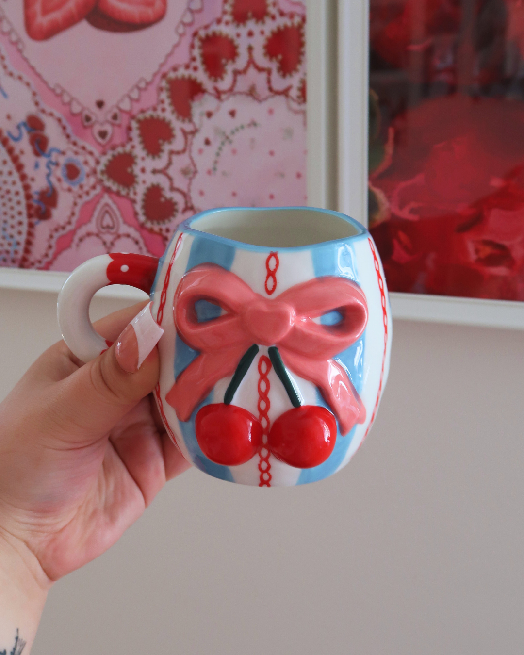 BLUE MUG WITH A BOW AND CHERRIES