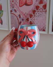 BLUE MUG WITH A BOW AND CHERRIES