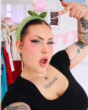 PLUSHY GREEN HEADBAND WITH A FLOWER