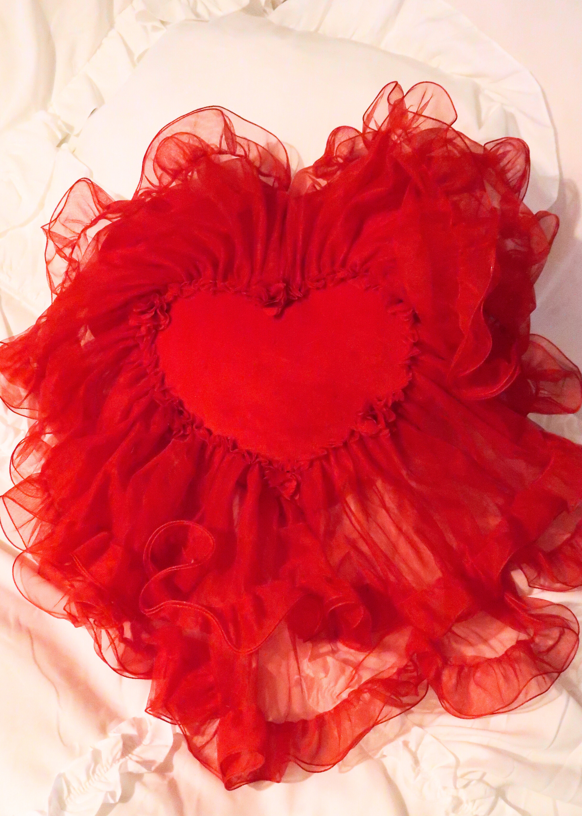 RED HEART PILLOW WITH A SKIRT