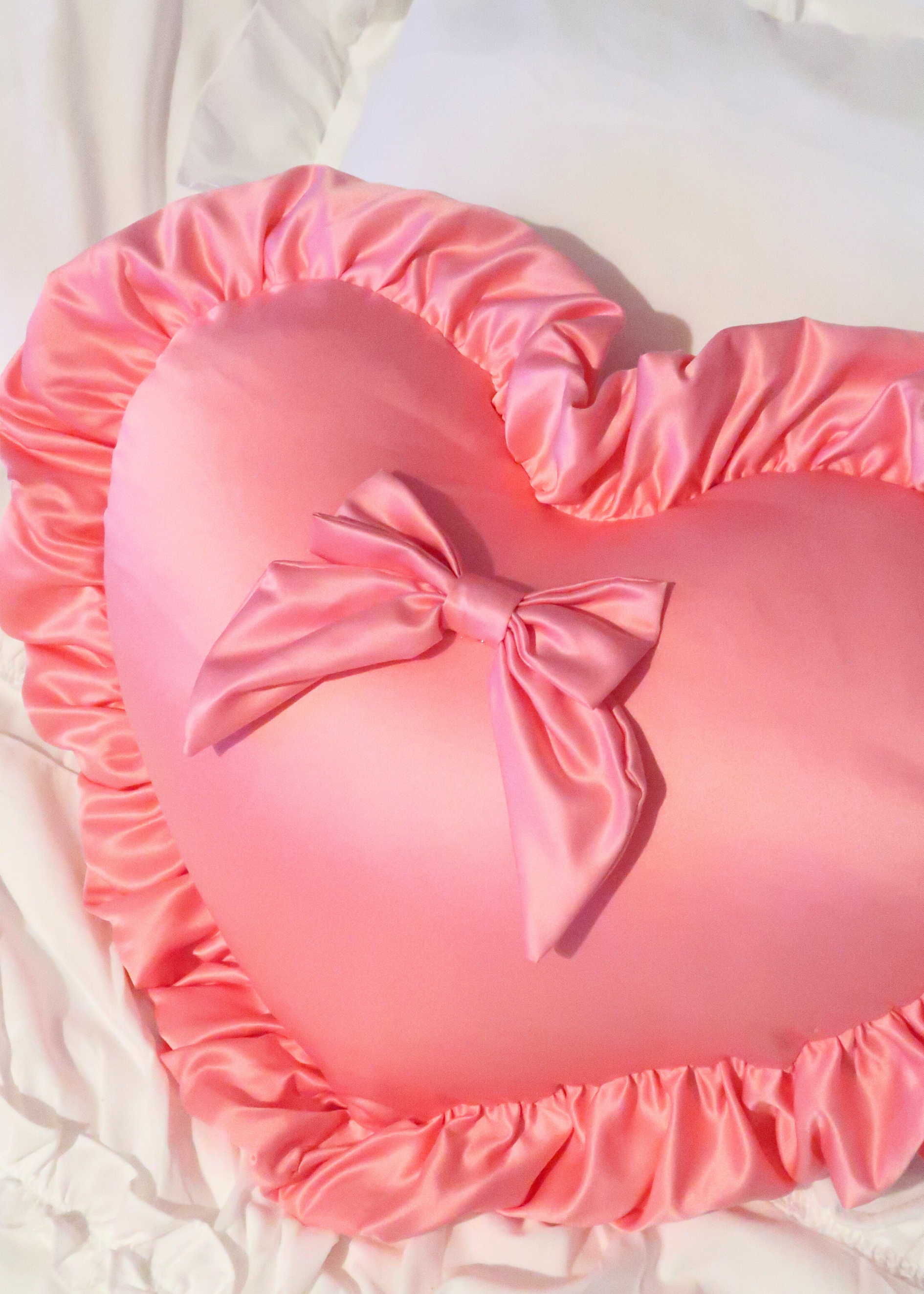 PINK HEART PILLOW WITH A BOW